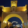Night street scene featuring Arco de Santa Catalina (Saint Catherine's Arch) in Antigua Guatemala