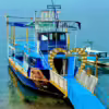 Tour boat at a dock on Lake Atitlán in Guatemala
