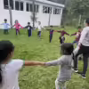 Children playing outside at The Little Mountain School in Joya Honda, GT